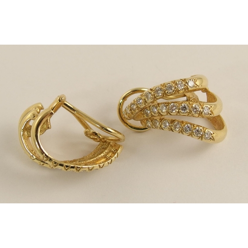 643 - A pair of 14ct gold diamond spray earrings