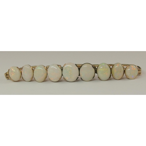 647 - A graduated white opal bracelet