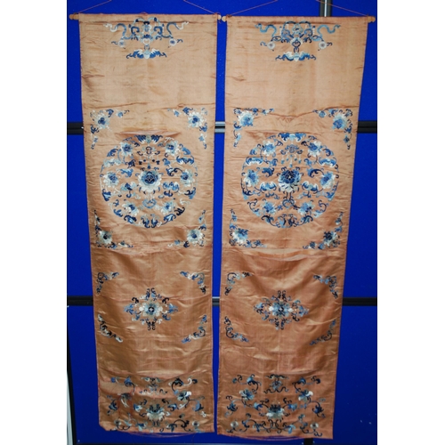 65 - A pair of Chinese silk embroidered panels