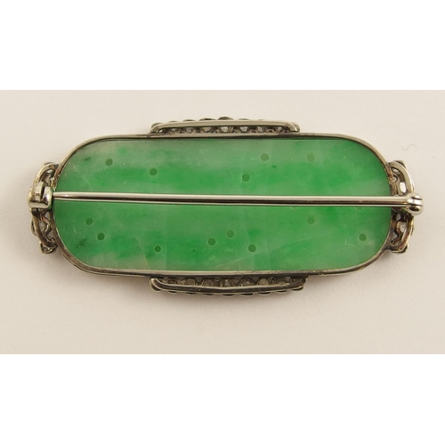 652 - A Chinese green hardstone and diamond brooch