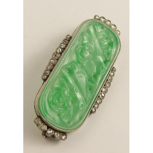 652 - A Chinese green hardstone and diamond brooch