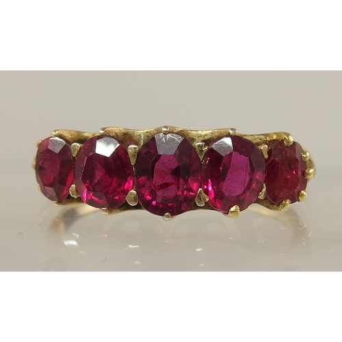 657 - A five stone ruby ring