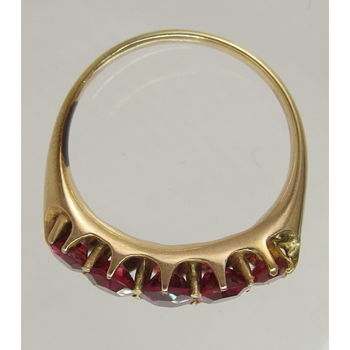 657 - A five stone ruby ring