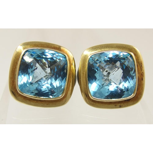 668 - A pair of blue topaz silver and 18ct gold detail earrings by David Yurman