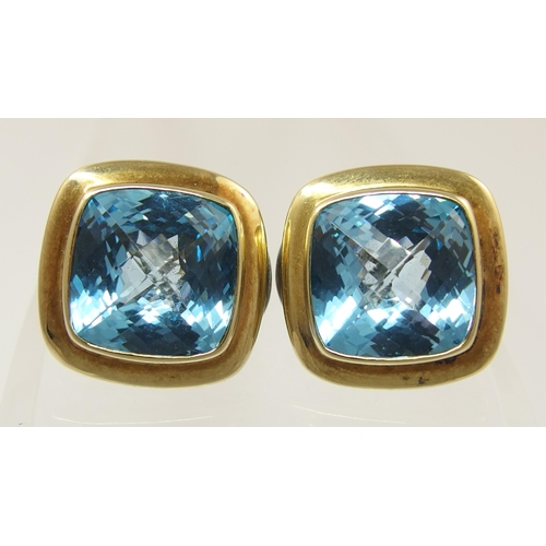 668 - A pair of blue topaz silver and 18ct gold detail earrings by David Yurman