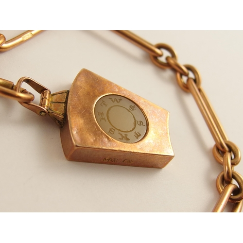 671 - A 15ct rose gold fob chain