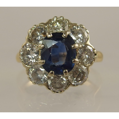 678 - A French sapphire and diamond flower ring