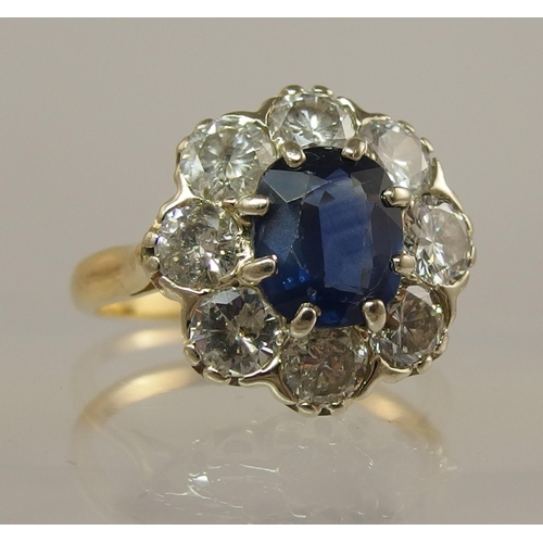 678 - A French sapphire and diamond flower ring