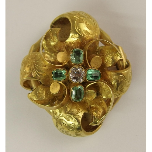 683 - A Victorian brooch set with emeralds and a diamond