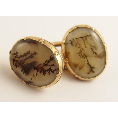 684 - A pair of moss agate cufflinks