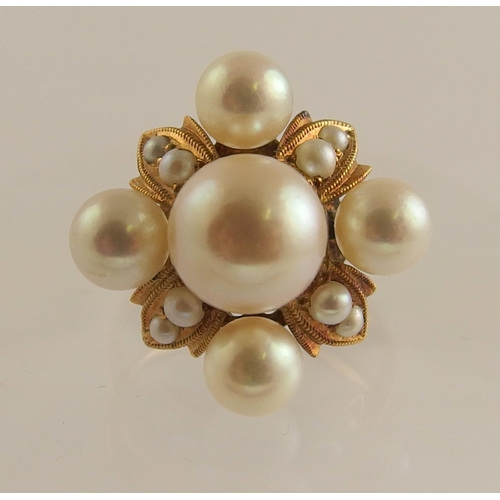 690 - An 18ct gold pearl dress ring