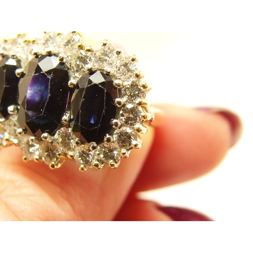 691 - An 18ct substantial sapphire and diamond ring