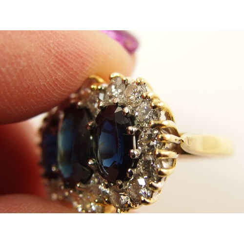 691 - An 18ct substantial sapphire and diamond ring