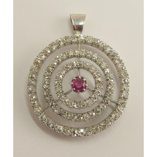 692 - A ruby and diamond pendant