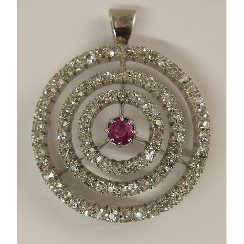 692 - A ruby and diamond pendant