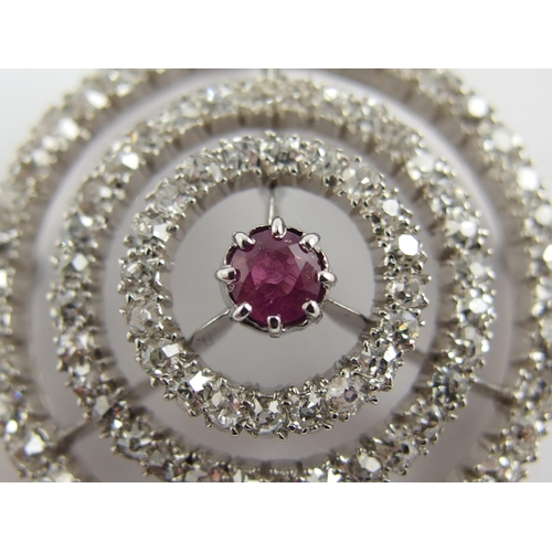 692 - A ruby and diamond pendant