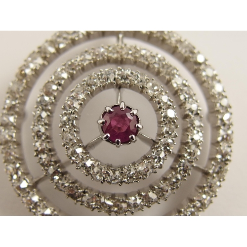 692 - A ruby and diamond pendant