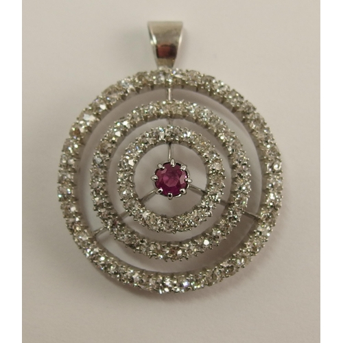 692 - A ruby and diamond pendant