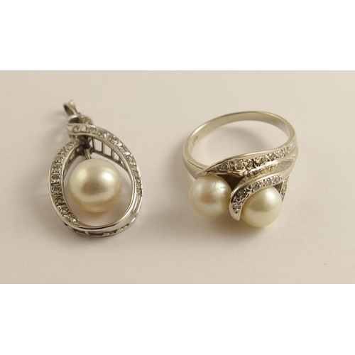 695 - A 14ct gold diamond and pearl pendant and ring