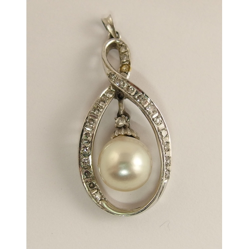 695 - A 14ct gold diamond and pearl pendant and ring