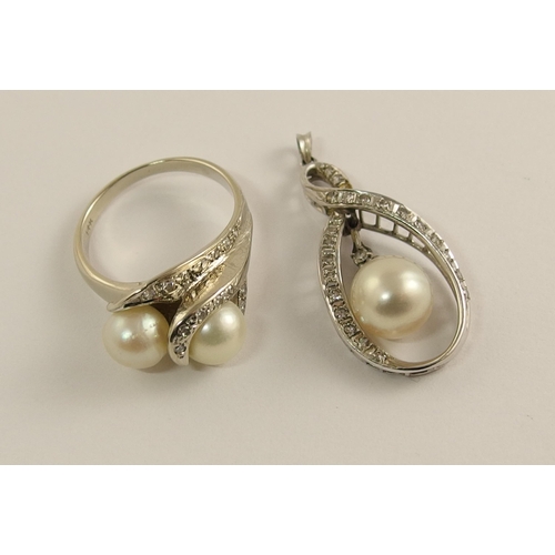 695 - A 14ct gold diamond and pearl pendant and ring