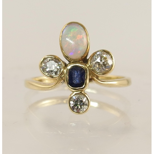 706 - A 9ct gold ring set with diamonds  sapphire and opal