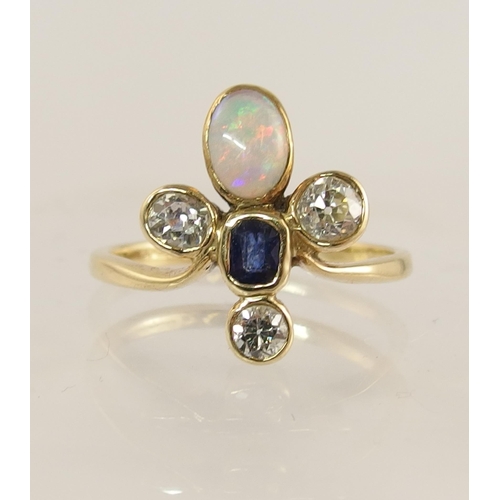 706 - A 9ct gold ring set with diamonds  sapphire and opal