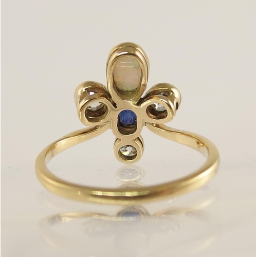 706 - A 9ct gold ring set with diamonds  sapphire and opal