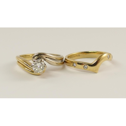 707 - An 18ct gold diamond solitaire with an 18ct diamond set wedding band