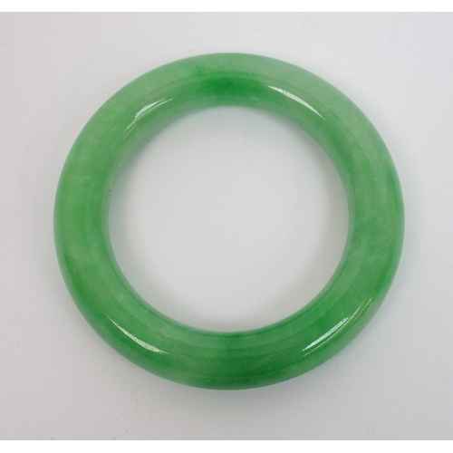 71 - A Chinese hardstone bangle