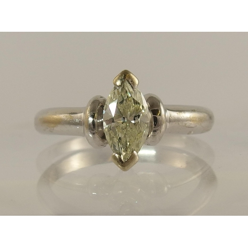 711 - A diamond marquis solitaire ring of approx 0.90cts