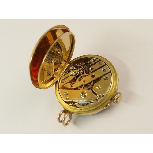 714 - A French diamond and enamel pendant watch