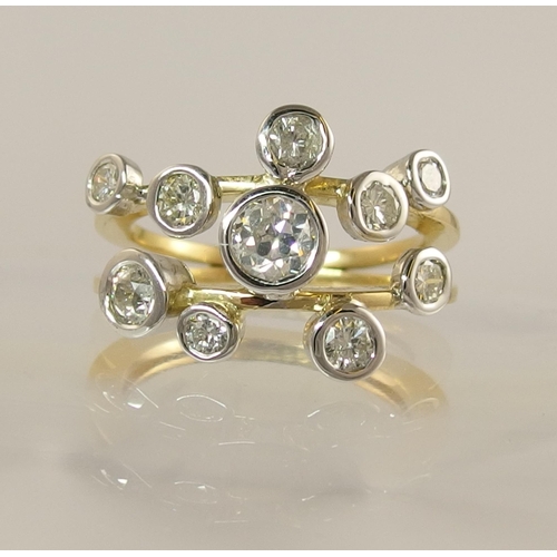 721 - An 18ct gold diamond cluster ring of approx 1.20cts