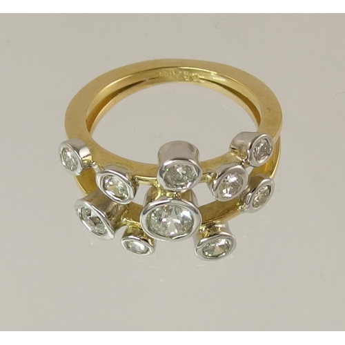 721 - An 18ct gold diamond cluster ring of approx 1.20cts