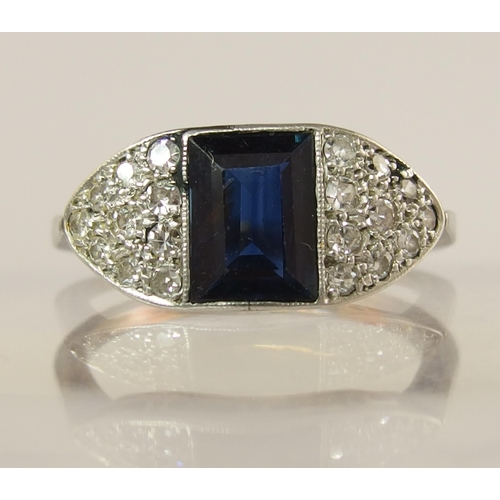 723 - An 18ct and platinum sapphire and diamond ring