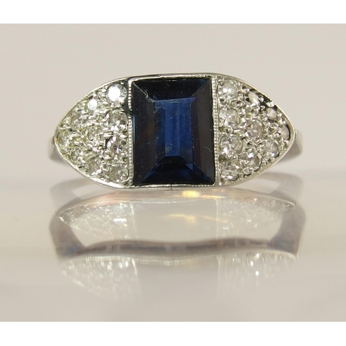 723 - An 18ct and platinum sapphire and diamond ring