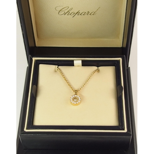 726 - A Chopard 18ct gold happy diamonds pendant