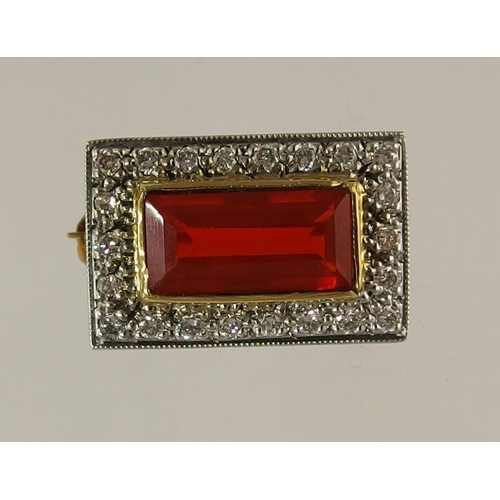 728 - An unusual fire opal and diamond brooch