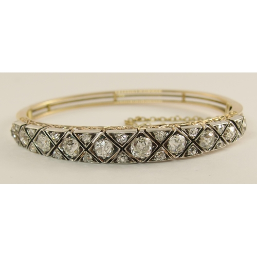 731 - An early 20th century diamond bangle