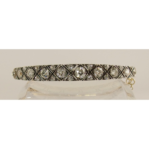 731 - An early 20th century diamond bangle