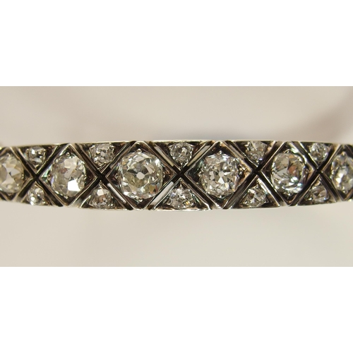 731 - An early 20th century diamond bangle