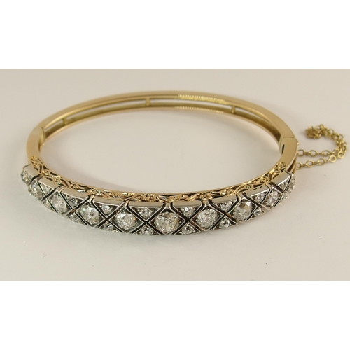 731 - An early 20th century diamond bangle