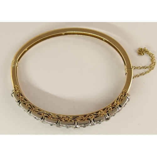 731 - An early 20th century diamond bangle