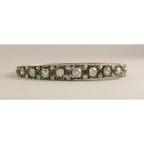 731 - An early 20th century diamond bangle