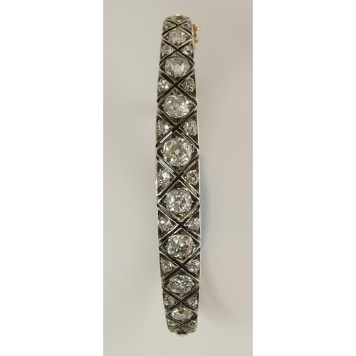 731 - An early 20th century diamond bangle