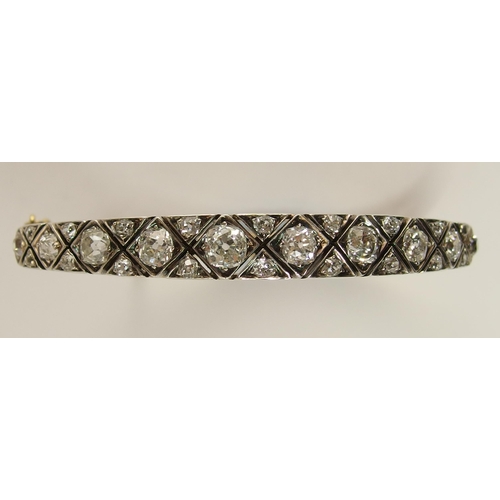 731 - An early 20th century diamond bangle