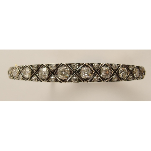 731 - An early 20th century diamond bangle