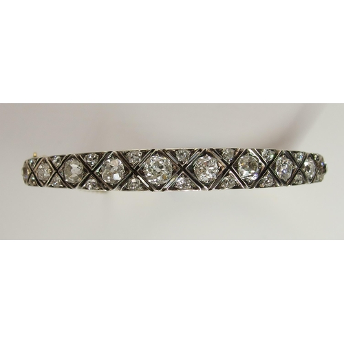 731 - An early 20th century diamond bangle