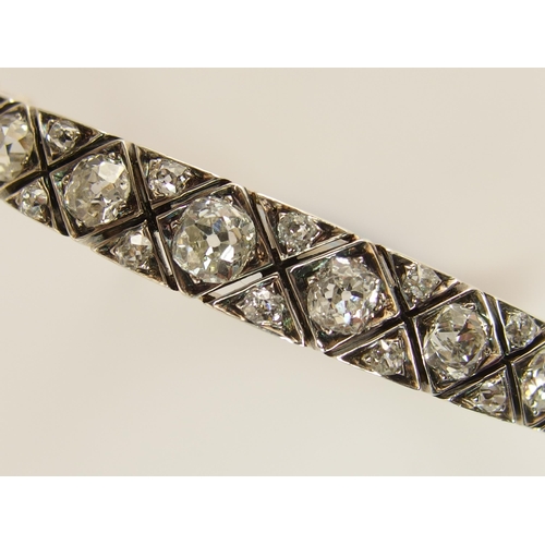 731 - An early 20th century diamond bangle