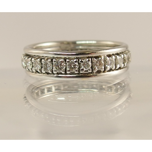 734 - A French 18ct white gold full eternity ring